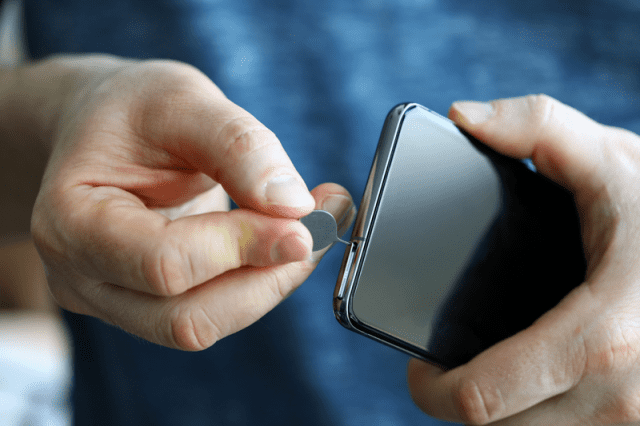 Ejecting a SIM card on an Android smartphone Ejecting a SIM card on an Android smartphone